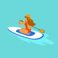 Girl paddleboarding, sitting paddling on a board in the sea