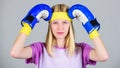 Girl painful face embrace head with boxing gloves. Headache concept. Keep calm and get rid of headache. Beat headache