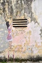 Girl painted by Ernest Zacharevic in Ipoh.
