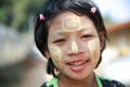 Girl painting tanaka on face