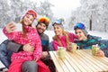 Girl with parents and brother making selfie at winter holiday Royalty Free Stock Photo