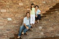 Girl and parents on stairs Royalty Free Stock Photo