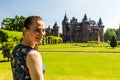 Girl in the park of De Haar Castle in Netherlands Royalty Free Stock Photo