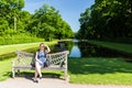 Girl in the park of De Haar Castle in Netherlands Royalty Free Stock Photo