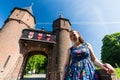 Girl in the park of De Haar Castle in Netherlands Royalty Free Stock Photo