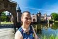 Girl in the park of De Haar Castle in Netherlands Royalty Free Stock Photo