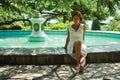 Girl in a park near the fountain