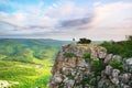 Girl on the peak of mountain