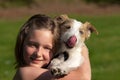 Girl with pet dog Royalty Free Stock Photo