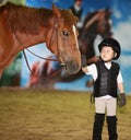 Girl petting horse