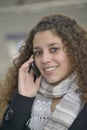 Girl phoning in train station Royalty Free Stock Photo