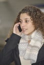 Girl phoning in train station Royalty Free Stock Photo