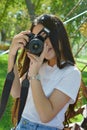 Girl with photo camera Royalty Free Stock Photo