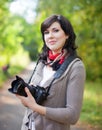 Girl with photocamera Royalty Free Stock Photo