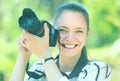 Girl with photocamera at park Royalty Free Stock Photo