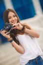 Girl photographer with professional SLR camera Royalty Free Stock Photo