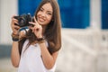 Girl photographer with professional SLR camera Royalty Free Stock Photo