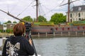 Girl photographs the exhibits of the Netherlands Maritime Museum