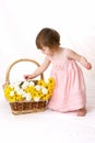 Girl picking flower petals