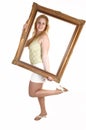 Girl with picture frame. Royalty Free Stock Photo