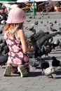 Girl and a pigeons