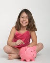 Girl with piggy bank