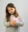 Girl piggy bank Royalty Free Stock Photo