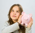 Girl piggy bank Royalty Free Stock Photo