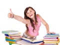 Girl with pile book showing thumb up. Royalty Free Stock Photo