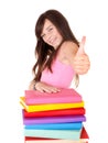 Girl with pile book showing thumb up. Royalty Free Stock Photo
