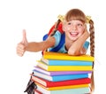 Girl with pile of books showing thumb up.