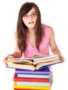 Girl with pile colored book . Royalty Free Stock Photo