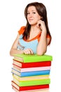Girl with pile colored book