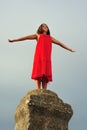 Girl on pillar column Royalty Free Stock Photo