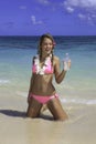 Girl in pink bikini at the beach Royalty Free Stock Photo