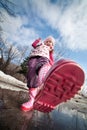 Girl in pink boots Royalty Free Stock Photo