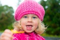 Girl with pink cap