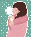 girl in pink coat holds hot coffee