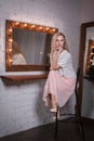 Girl in a pink dress in the room Royalty Free Stock Photo