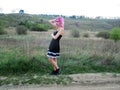 Girl with pink hair goes on a trip to the mountains Royalty Free Stock Photo