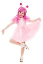 A girl with pink hair in a pink dress dancing Royalty Free Stock Photo