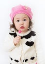 Girl in Pink Hat with Lollipop2 Royalty Free Stock Photo