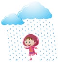 Girl in pink raincoat standing in the rain