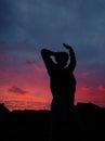 Girl and pink sunset