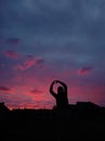 Girl and pink sunset