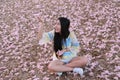 Girl with Pink trumpet tree.