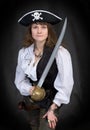 The girl - pirate with a sabre in hands