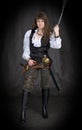 The girl - pirate with a sabre in hands Royalty Free Stock Photo
