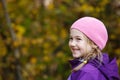 Girl with plait in winter cap Royalty Free Stock Photo