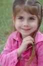 Girl plaiting her hair Royalty Free Stock Photo